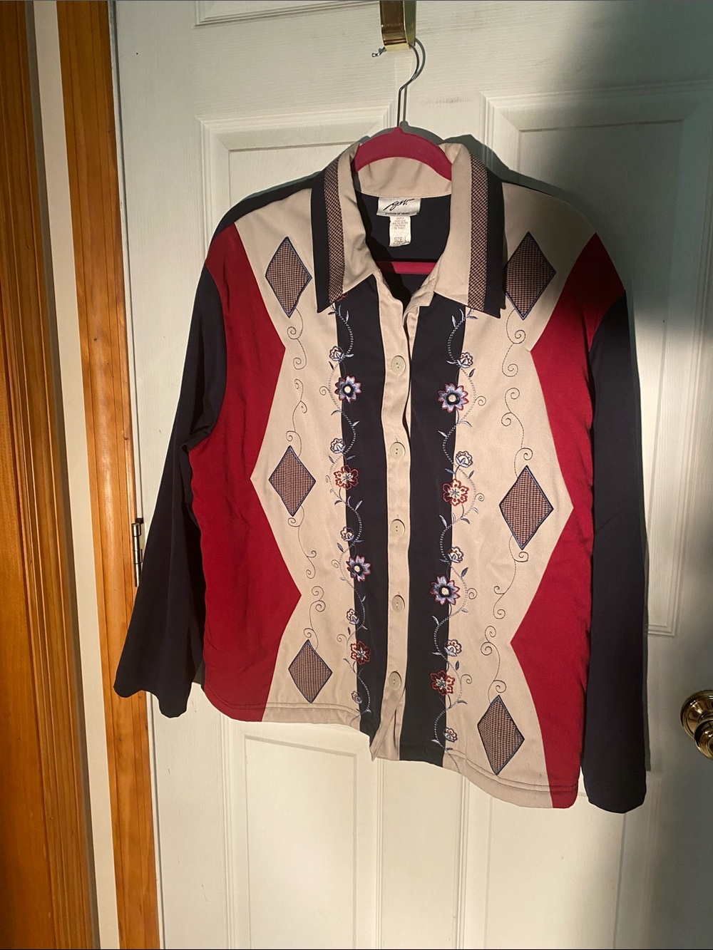 Ladies button up quilted look shirt. Size large.